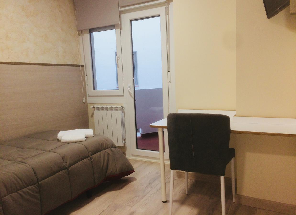 Habitación Triple Clásica con baño compartido